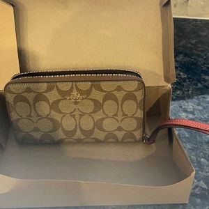 Coach signature brown wristlet/wallet